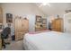 Bedroom with natural light, closet, and en suite bathroom and office area at 3910 Stillwood Dr., Myrtle Beach, SC 29588