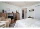 Bright bedroom with a comfortable bed, wooden furnishings, and a doorway leading to another room at 3910 Stillwood Dr., Myrtle Beach, SC 29588