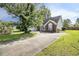 Charming home featuring a long driveway and well-maintained lawn, inviting curb appeal at 3910 Stillwood Dr., Myrtle Beach, SC 29588