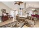 Spacious living room showcasing vaulted ceiling, ceiling fan, and an open floor plan at 3910 Stillwood Dr., Myrtle Beach, SC 29588