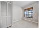 Bedroom featuring neutral decor, tile flooring, and view at 4000 North Ocean Blvd. # 1002, North Myrtle Beach, SC 29582