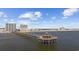 Scenic view of the fishing pier extending into the ocean, with people fishing or sightseeing on a clear day at 4000 North Ocean Blvd. # 1002, North Myrtle Beach, SC 29582