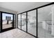Open living space with tile floors and a view of the beach and ocean at 4000 North Ocean Blvd. # 1002, North Myrtle Beach, SC 29582