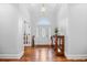 Bright foyer features hardwood floors, a decorative table and elegant lighting at 423 Chapman Loop, Pawleys Island, SC 29585