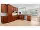 Well appointed kitchen featuring granite countertops, tile floors and a stainless dishwasher at 423 Chapman Loop, Pawleys Island, SC 29585