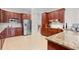 Kitchen with stainless steel appliances, granite countertops, and tile flooring at 423 Chapman Loop, Pawleys Island, SC 29585