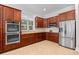 Kitchen with stainless steel appliances, granite countertops, and tile flooring at 423 Chapman Loop, Pawleys Island, SC 29585