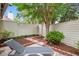 Backyard area with lounge chair, patio and landscaping at 430 Ocean Creek Dr. # 2534, Myrtle Beach, SC 29572