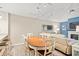 A dining area adjoins the living room with fireplace, creating an open layout perfect for entertaining and Gathering gatherings at 430 Ocean Creek Dr. # 2534, Myrtle Beach, SC 29572