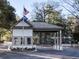 Welcoming gated entrance with American and state flags, providing security and a sense of arrival at 430 Ocean Creek Dr. # 2534, Myrtle Beach, SC 29572