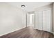 This bedroom boasts wood-look flooring and built-in closets for storage at 4300 Crows Nest Ct., Myrtle Beach, SC 29579