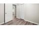 This bedroom boasts wood-look flooring and built-in closets for storage at 4300 Crows Nest Ct., Myrtle Beach, SC 29579