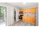 Kitchen boasts wood cabinets, stainless appliances, and subway tile backsplash at 4300 Crows Nest Ct., Myrtle Beach, SC 29579