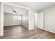 Open living space with new flooring, recessed lights and an open doorway leading to another room at 4300 Crows Nest Ct., Myrtle Beach, SC 29579