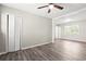 Inviting living room showcases wood floors, a ceiling fan, and neutral paint for easy customization at 4300 Crows Nest Ct., Myrtle Beach, SC 29579