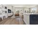 Spacious living room with modern furnishings and view of the backyard with lake at 438 Clear Lake Dr., Conway, SC 29526
