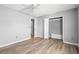 This bedroom has an ensuite bathroom, closet, neutral walls, and light flooring at 4406 Barcelona Ln., Little River, SC 29566
