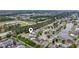 Beautiful aerial view showcasing this property and surrounding neighborhood landscaping and pond at 4603 East Walkerton Rd., Myrtle Beach, SC 29579