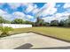 Large, grassy backyard featuring a white fence and privacy landscaping at 4603 East Walkerton Rd., Myrtle Beach, SC 29579