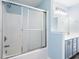 Bright bathroom with tiled shower, and vanity with updated fixtures at 4603 East Walkerton Rd., Myrtle Beach, SC 29579