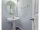 Bathroom featuring pedestal sink and white door at 4603 East Walkerton Rd., Myrtle Beach, SC 29579