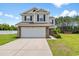 Charming two-story home featuring a spacious two-car garage and a well-maintained lawn in a Gathering-friendly neighborhood at 4603 East Walkerton Rd., Myrtle Beach, SC 29579
