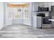 Bright kitchen featuring stainless steel appliances, and light blue cabinetry at 4603 East Walkerton Rd., Myrtle Beach, SC 29579