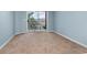 A tranquil bedroom offers a private balcony overlooking the water at 4633 Lightkeepers Way # 5-F, Little River, SC 29566