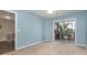 A bedroom features a balcony and connected room at 4633 Lightkeepers Way # 5-F, Little River, SC 29566