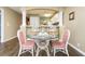 Dining area with a glass table and wicker chairs at 4633 Lightkeepers Way # 5-F, Little River, SC 29566