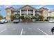 Spacious condominium complex with ample parking and manicured landscaping for a beautiful community at 4633 Lightkeepers Way # 5-F, Little River, SC 29566