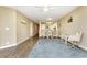 Inviting living room featuring wood flooring and a neutral color palette, perfect for relaxation and entertaining guests at 4633 Lightkeepers Way # 5-F, Little River, SC 29566