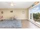 Inviting living room featuring natural light, and wood flooring at 4633 Lightkeepers Way # 5-F, Little River, SC 29566