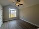 Spacious bedroom featuring a ceiling fan and a large window with view at 475 Highway 348, Loris, SC 29569