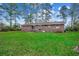 View of backyard with lawn at 4810 Circle Dr., Loris, SC 29569