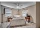 Bedroom features neutral paint, ceiling fan, and wood look floors at 4810 Circle Dr., Loris, SC 29569