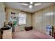 A classic bedroom with a world map on the wall, simple decor, and carpeted flooring at 4810 Circle Dr., Loris, SC 29569