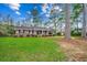 Brick home with car port and front lawn at 4810 Circle Dr., Loris, SC 29569