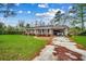 Brick home with car port and front lawn at 4810 Circle Dr., Loris, SC 29569