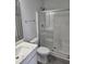 Modern bathroom featuring a vanity, toilet, mirror, and shower with glass door at 4823 Riverside Dr., North Myrtle Beach, SC 29582