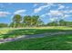 Picturesque golf course with lush green fairways and mature trees at 505 Joy Way Ct., Longs, SC 29568
