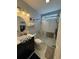 Modern bathroom featuring a glass shower door, a vanity with a sink and mosaic tile accents at 550 Bridgeport Dr., Myrtle Beach, SC 29577