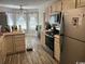 Functional kitchen featuring a gas range, stainless steel appliances and light wood cabinets at 550 Bridgeport Dr., Myrtle Beach, SC 29577