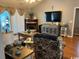 Inviting living room with hardwood floors, a cozy fireplace, and neutral tones for a warm atmosphere at 550 Bridgeport Dr., Myrtle Beach, SC 29577