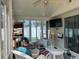 Bright sunroom with a ceiling fan, tiled floors and ample windows at 550 Bridgeport Dr., Myrtle Beach, SC 29577