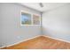 Bedroom with hardwood floors, a window and baseboard heating at 5612 N Kings Hwy., Myrtle Beach, SC 29577