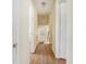 Hallway with hardwood floors, showing doorway at end of hallway at 5612 N Kings Hwy., Myrtle Beach, SC 29577