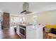 Bright kitchen island with stainless steel oven and vent hood at 5612 N Kings Hwy., Myrtle Beach, SC 29577