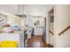 Modern kitchen with white cabinetry, stainless steel appliances, and hardwood floors at 5612 N Kings Hwy., Myrtle Beach, SC 29577