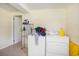 Functional laundry room with washer, dryer, and practical storage at 5612 N Kings Hwy., Myrtle Beach, SC 29577